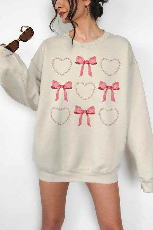 HEARTS AND BOWS PEARL OVERSIZED SWEATSHIRT
